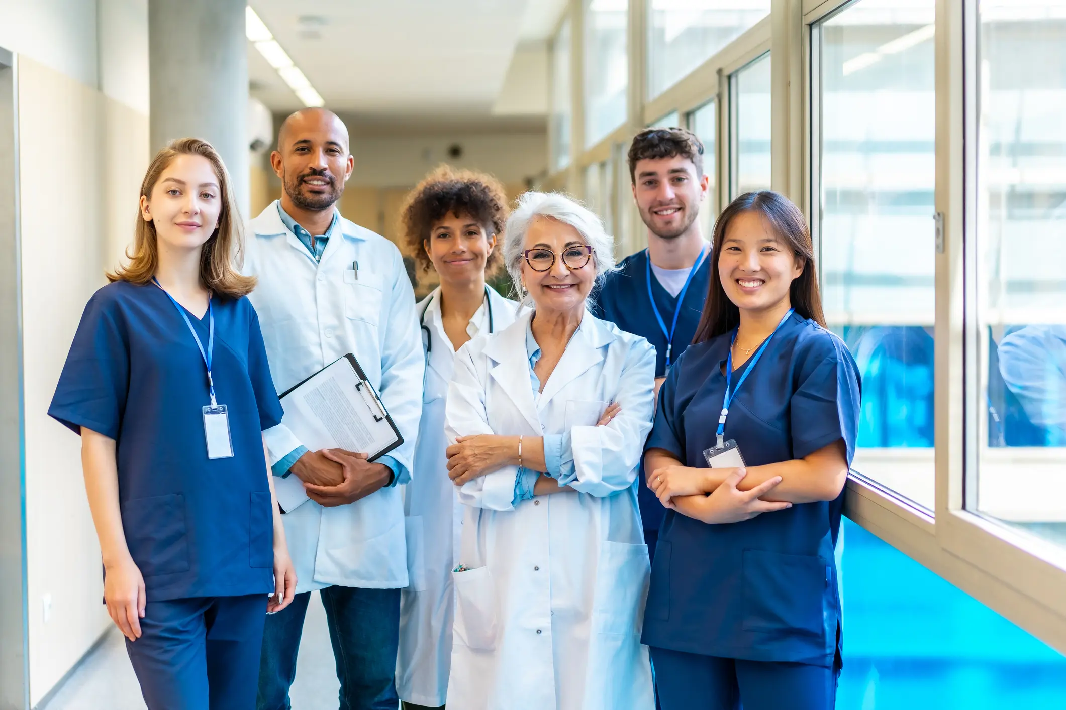 Diverse healthcare professionals posing together