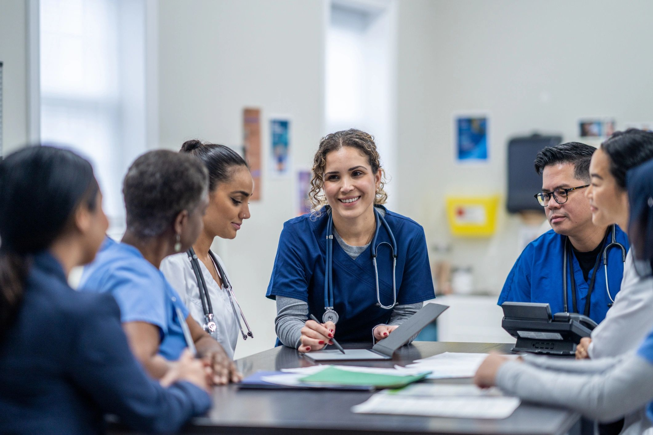 Healthcare professionals discussing in a group